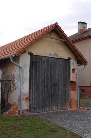 Oprava vrat hasičárny v&nbsp;Kaprovce 1